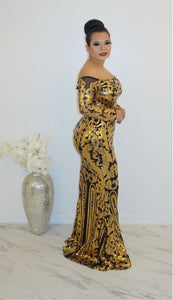 Mariah Carey gold dress